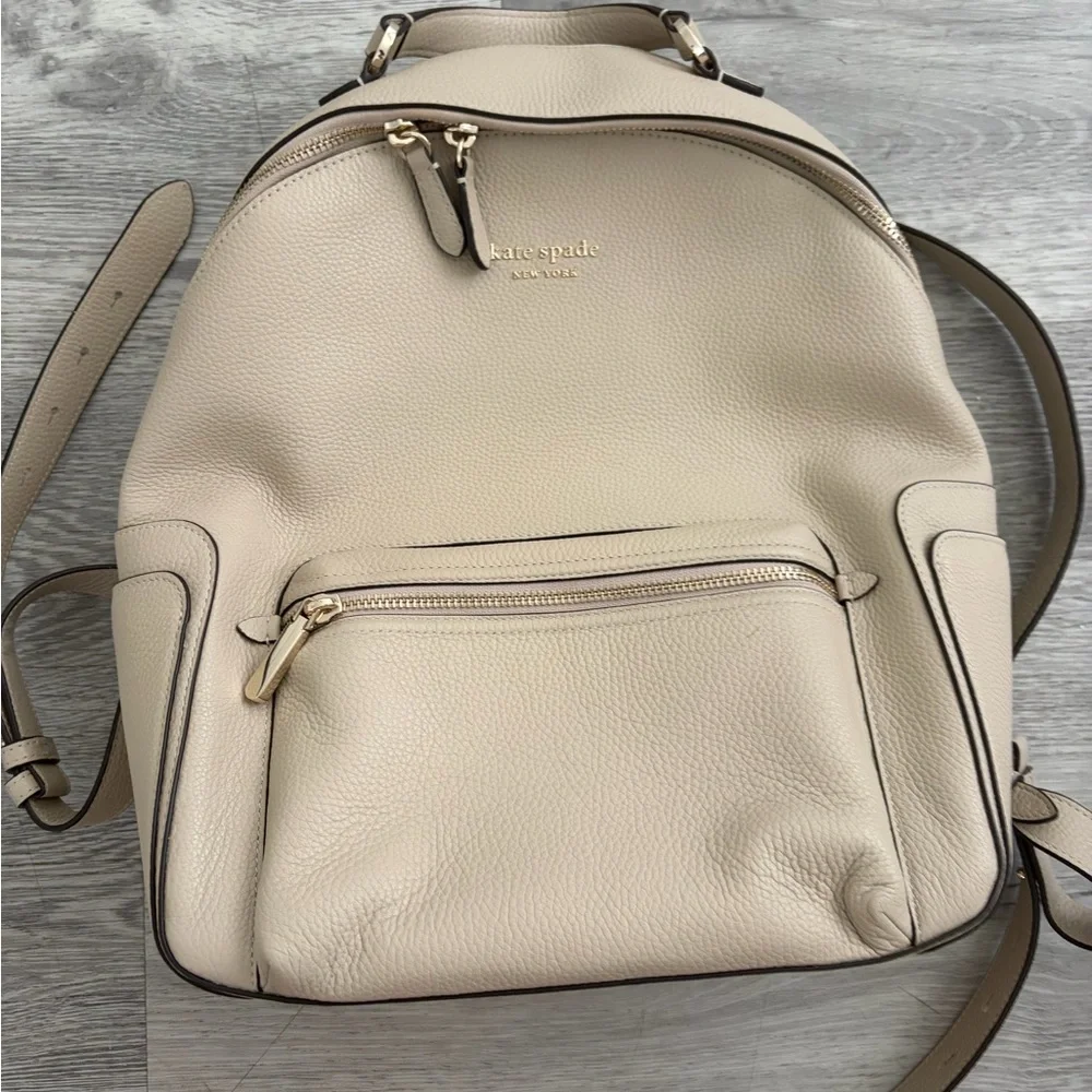 kate spade pebble leather backpack in cream with gold hardware